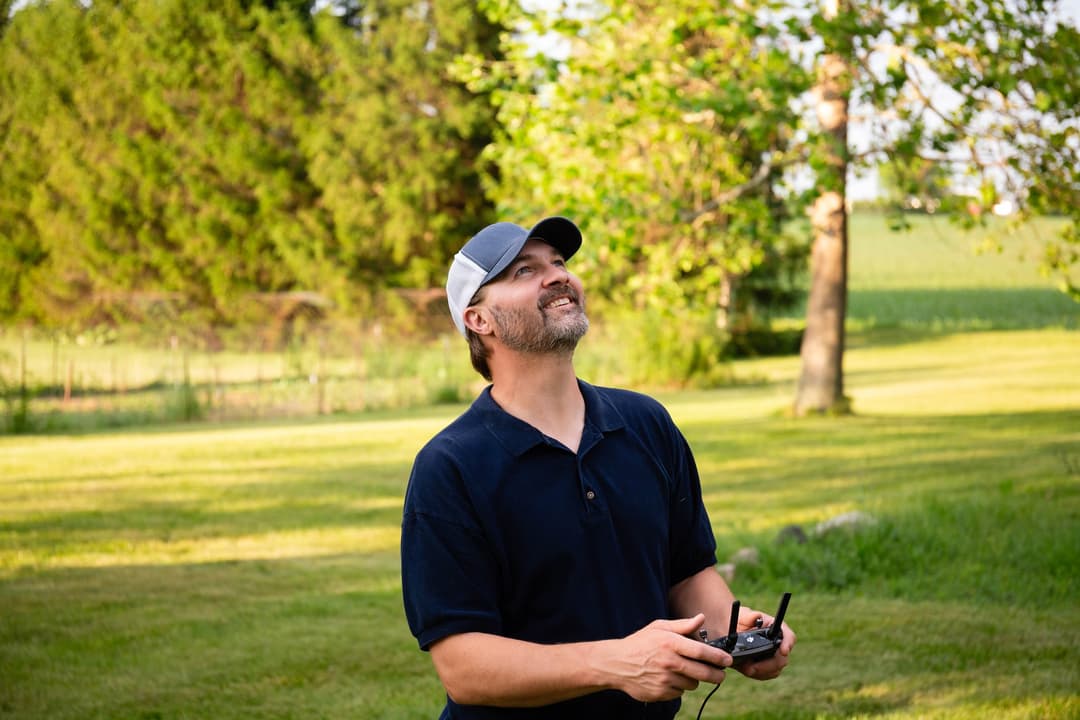 Mike Lacheta, FAA Part 107 licensed drone pilot, operating a drone during an inspection